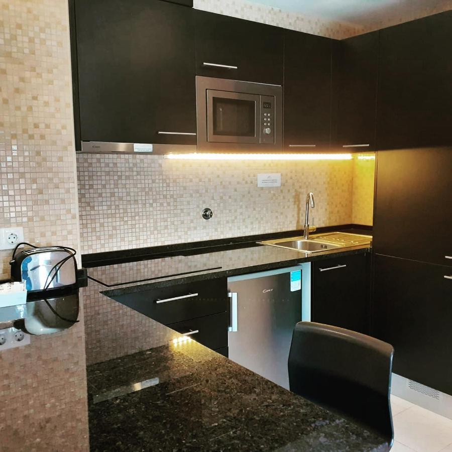 Apartahotel & By